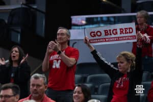Nebraska Cornhusker fans hold up a sign during a college basketball game against Indiana on Mar 4th, 2026, in Indianapolis, Indiana. Photo by Brandon Tiedemann