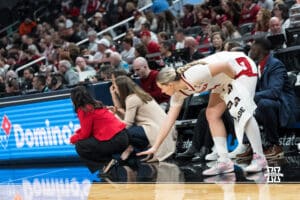 Nebraska Cornhusker Emily Fisher (34) celebrates on the bench during a college basketball game against Indiana on Mar 4th, 2026, in Indianapolis, Indiana. Photo by Brandon Tiedemann