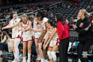 Nebraska Cornhusker bench celebrates during a college basketball game against Indiana on Mar 4th, 2026, in Indianapolis, Indiana. Photo by Brandon Tiedemann