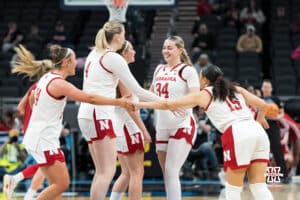 Nebraska Cornhuskers celebrate a timeout call during a college basketball game against Indiana on Mar 4th, 2026, in Indianapolis, Indiana. Photo by Brandon Tiedemann