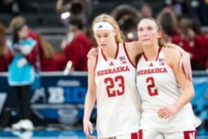 Nebraska Cornhuskers Logan Nissley (2) and Britt Prince (23) walk off the court together during a college basketball game against Indiana on Mar 4th, 2026, in Indianapolis, Indiana. Photo by Brandon Tiedemann