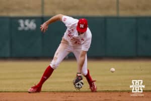 Nebraska Cornhusker infielder Dylan Carey (15) misses fielding the ball against the Omaha Mavericks in the fourth inning during a college baseball game on Tuesday, March 3, 2026, in Lincoln, Nebraska. Photo by John S. Peterson.