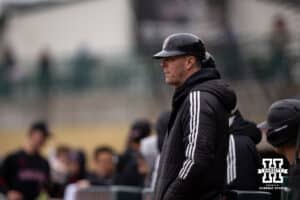 Omaha Maverick head coach Evan Porter watching the action on the field against the Nebraska Cornhuskers during a college baseball game on Tuesday, March 3, 2026, in Lincoln, Nebraska. Photo by John S. Peterson.