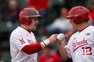 Nebraska Cornhusker infielder Josh Overbeek (4) celebrates scoring a run in the first against the Omaha Mavericks during a college baseball game on Tuesday, March 3, 2026, in Lincoln, Nebraska. Photo by John S. Peterson.