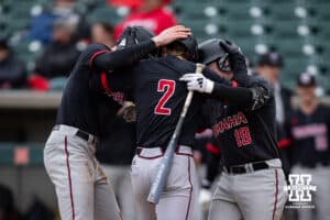 Omaha Mavericks celebrates Omaha Maverick Tyler Bishop (2) two run home run in the first inning against the Nebraska Cornhuskers during a college baseball game on Tuesday, March 3, 2026, in Lincoln, Nebraska. Photo by John S. Peterson.