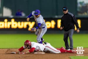 Nebraska Cornhusker Josh Overbeek (4) slides at second hitting a double against the Kansas State Wildcats in the ninth inning during a college baseball game at Haymarket Park on Tuesday, April 28, 2026, in Lincoln, Neb. Photo by John S. Peterson.