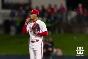 Nebraska Cornhusker pitcher J'shawn Unger (37) licks his finger before throwing a pitch against the Kansas State Wildcats in the ninth inning during a college baseball game at Haymarket Park on Tuesday, April 28, 2026, in Lincoln, Neb. Photo by John S. Peterson.