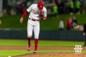 Nebraska Cornhusker pitcher J'shawn Unger (37) scrapes off his shoe before throwing a pitch in the ninth inning against the Kansas State Wildcats during a college baseball game at Haymarket Park on Tuesday, April 28, 2026, in Lincoln, Neb. Photo by John S. Peterson.