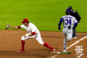Nebraska Cornhusker infielder Case Sanderson (14) forces out Kansas State Wildcat Ty Smolinski (34) at first base to finish a double-play in the eighth inning during a college baseball game at Haymarket Park on Tuesday, April 28, 2026, in Lincoln, Neb. Photo by John S. Peterson.