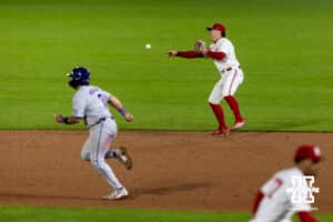 Nebraska Cornhusker infielder Rhett Stokes (9) throws to second for the double-play in the eighth inning against the Kansas State Wildcats during a college baseball game at Haymarket Park on Tuesday, April 28, 2026, in Lincoln, Neb. Photo by John S. Peterson.