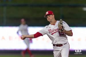 Nebraska Cornhusker infielder Dylan Carey (15) throws to first against the Kansas State Wildcats in the seventh during a college baseball game at Haymarket Park on Tuesday, April 28, 2026, in Lincoln, Neb. Photo by John S. Peterson.