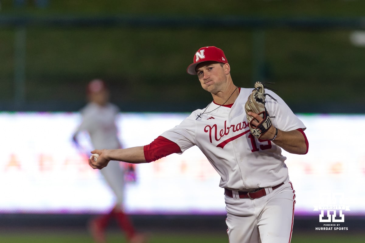 Nebraska Cornhusker infielder Dylan Carey (15) throws to first against the Kansas State Wildcats in the seventh during a college baseball game at Haymarket Park on Tuesday, April 28, 2026, in Lincoln, Neb. Photo by John S. Peterson.