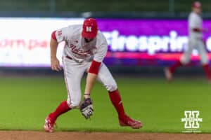Nebraska Cornhusker infielder Dylan Carey (15) scoops up the ball against the Kansas State Wildcats in the seventh inning during a college baseball game at Haymarket Park on Tuesday, April 28, 2026, in Lincoln, Neb. Photo by John S. Peterson.