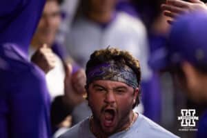 Kansas State Wildcat Bear Madliak (3) celebrates hitting a home run in the dugout against the Nebraska Cornhuskers in the sixth inning during a college baseball game at Haymarket Park on Tuesday, April 28, 2026, in Lincoln, Neb. Photo by John S. Peterson.