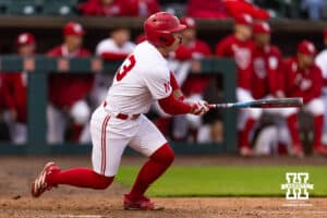 Nebraska Cornhusker Will Jesske (13) hits a single in the fifth inning against the Kansas State Wildcats during a college baseball game at Haymarket Park on Tuesday, April 28, 2026, in Lincoln, Neb. Photo by John S. Peterson.
