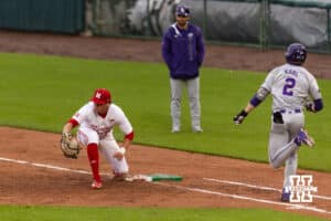 Nebraska Cornhusker infielder Case Sanderson (14) forces out Kansas State Wildcat Cadyn Karl (2) at first in the fourth inning during a college baseball game at Haymarket Park on Tuesday, April 28, 2026, in Lincoln, Neb. Photo by John S. Peterson.