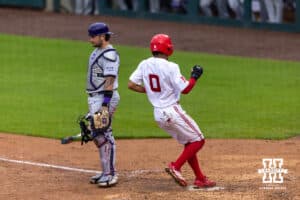 Nebraska Cornhusker Jeter Worthley (0) scores a run against the Kansas State Wildcats in the third inning during a college baseball game at Haymarket Park on Tuesday, April 28, 2026, in Lincoln, Neb. Photo by John S. Peterson.
