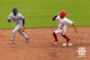 Nebraska Cornhusker Jeter Worthley (0) advances to third rounding second in the third against the Kansas State Wildcats during a college baseball game at Haymarket Park on Tuesday, April 28, 2026, in Lincoln, Neb. Photo by John S. Peterson.