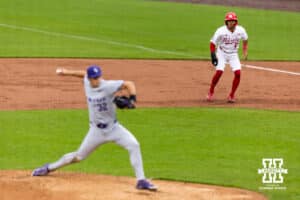 Nebraska Cornhusker Jeter Worthley (0) leads off first base as Kansas State Wildcat pitcher James Guyette (32) throws a pitch in the third inning during a college baseball game at Haymarket Park on Tuesday, April 28, 2026, in Lincoln, Neb. Photo by John S. Peterson.