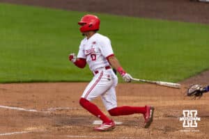 Nebraska Cornhusker Jeter Worthley (0) singles in the third inning against the Kansas State Wildcats during a college baseball game at Haymarket Park on Tuesday, April 28, 2026, in Lincoln, Neb. Photo by John S. Peterson.