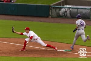 Nebraska Cornhusker infielder Case Sanderson (14) makes the out against Kansas State Wildcat Chandler Murray (52) in the third inning during a college baseball game at Haymarket Park on Tuesday, April 28, 2026, in Lincoln, Neb. Photo by John S. Peterson.