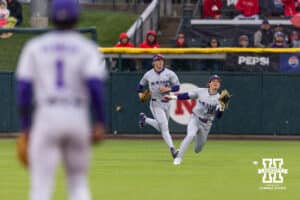 Kansas State Wildcat outfielder Micah Kendrick (18) misses the catching the ball allowing Nebraska Cornhusker Dylan Carey to score in the first inning during a college baseball game at Haymarket Park on Tuesday, April 28, 2026, in Lincoln, Neb. Photo by John S. Peterson.