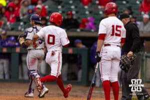 Nebraska Cornhusker Jeter Worthley (0) scores a run on wild pitch against the Kansas State Wildcats in the first inning during a college baseball game at Haymarket Park on Tuesday, April 28, 2026, in Lincoln, Neb. Photo by John S. Peterson.