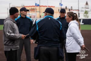 Omaha Mavericks head coach Mike Heard and Creighton Bluejays head coach Krista Wood meet before a college softball game on April 28, 2026, in Omaha, Nebraska. Photo by Brandon Tiedemann.