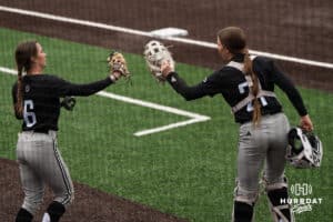Omaha Mavericks Maddia Groff (6) and Rylinn Groff (21) high five during a college softball game on April 28, 2026, in Omaha, Nebraska. Photo by Brandon Tiedemann.