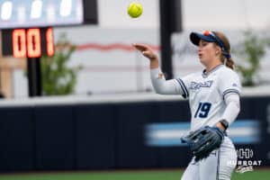 Creighton Bluejays Avery Barnard (19) throws a ball back during a college softball game on April 28, 2026, in Omaha, Nebraska. Photo by Brandon Tiedemann.