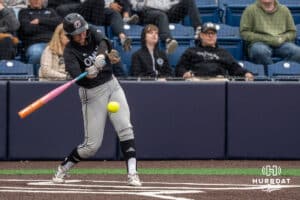Omaha Mavericks Alyson Edwards (18) hits during a college softball game on April 28, 2026, in Omaha, Nebraska. Photo by Brandon Tiedemann.