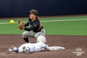Creighton Bluejays Emma Bailey (16) steals second base during a college softball game on April 28, 2026, in Omaha, Nebraska. Photo by Brandon Tiedemann.