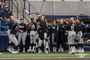 Omaha Mavericks celebrate Taylor Sedlacek (29) home run during a college softball game on April 28, 2026, in Omaha, Nebraska. Photo by Brandon Tiedemann.