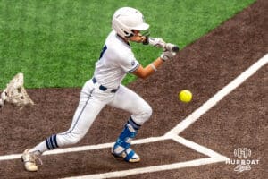 Creighton Bluejays Ashten Pierson (4) bunts during a college softball game on April 28, 2026, in Omaha, Nebraska. Photo by Brandon Tiedemann.