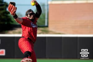 Nebraska pitcher Alexis Jensen (99) swings around her next pitch during a college women’s softball game, Apr. 24, 2026, Lincoln, Nebraska. Photo by Braden Cochran.