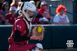 Nebraska catcher Carlie Mulbach (72) puts the ball back in her hand to throw back to pitcher Alexis Jensen (99) during a college women’s softball game, Apr. 24, 2026, Lincoln, Nebraska. Photo by Braden Cochran.