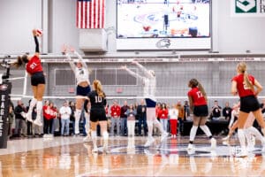 Nebraska Cornhuskers outside hitter Skyler Pierce (21) spikes the ball for the last point in the fourth set during a college volleyball match on Saturday, April 25, 2026, in Chadron, Neb. Photo by John S. Peterson.