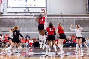 Nebraska Cornhuskers middle blocker Keoni Williams (17) spikes the ball against Northern Colorado Bears middle blocker Maddie Rink (14) during a college volleyball match on Saturday, April 25, 2026, in Chadron, Neb. Photo by John S. Peterson.