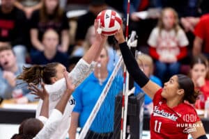 Nebraska Cornhusker outside hitter Teraya Sigler (11) battles at the net against the Northern Colorado Bears during a college volleyball match on Saturday, April 25, 2026, in Chadron, Neb. Photo by John S. Peterson.
