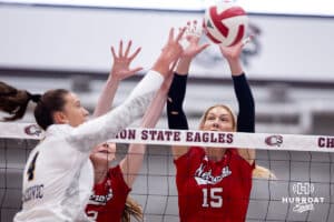 Nebraska Cornhuskers middle blocker Andi Jackson (15) blocks the ball against Northern Colorado Bears outside hitter Kylie Cackovic (4) during a college volleyball match on Saturday, April 25, 2026, in Chadron, Neb. Photo by John S. Peterson.