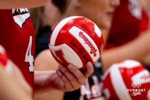 Nebraska Cornhuskers setter Campbell Flynn (4) wrote her name on the mini volleyball to throw out at introductions beore taking on the Northern Colorado Bears during a college volleyball match on Saturday, April 25, 2026, in Chadron, Neb. Photo by John S. Peterson.
