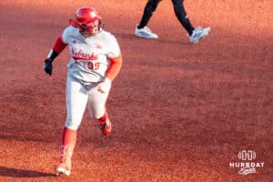 Nebraska Cornhusker Alexis Jensen (99) celebrates her homerun during a college softball game against Omaha on April 21, 2026, in Omaha, Nebraska. Photo by Brandon Tiedemann