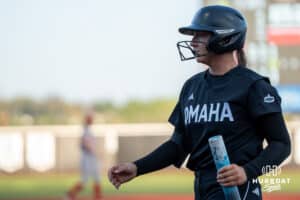 Omaha Maverick Ava Rongisch (23) walks to the dugout during a college softball game against Nebraska on April 21, 2026, in Omaha, Nebraska. Photo by Brandon Tiedemann