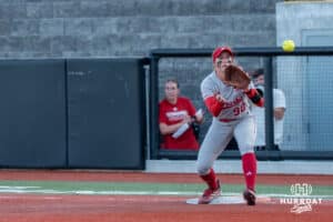 Nebraska Cornhusker Jordy Frahm (98) catches the throw during a college softball game against Omaha on April 21, 2026, in Omaha, Nebraska. Photo by Brandon Tiedemann