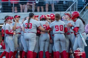 Nebraska Cornhuskers celebrate a Samantha Bland (29) homerun during a college softball game against Omaha on April 21, 2026, in Omaha, Nebraska. Photo by Brandon Tiedemann