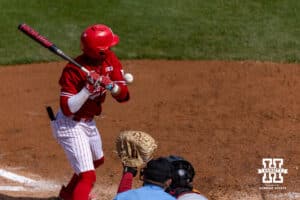 Nebraska Cornhusker Jeter Worthley (0) hit by pitch in the sixth inning against the Southern California Trojans during a college baseball game on Saturday, April 18, 2026, in Lincoln, Neb. Photo by John S. Peterson.