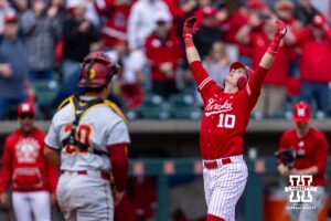 Nebraska Cornhusker Drew Grego (10) looks to the sky as he crosses home plate after hitting a home run in the third against the Southern California Trojans during a college baseball game on Saturday, April 18, 2026, in Lincoln, Neb. Photo by John S. Peterson.