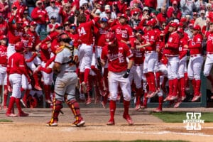 Nebraska Cornhuskers celebrate Case Sanderson's home run in the third inning against the Southern California Trojans during a college baseball game on Saturday, April 18, 2026, in Lincoln, Neb. Photo by John S. Peterson.