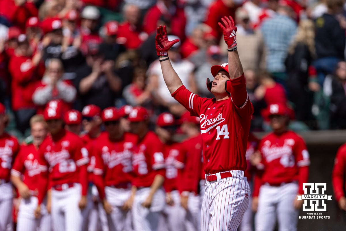 Nebraska Cornhusker Case Sanderson (14) looks to the sky as he crosses home plate after hitting a home run in the third against the Southern California Trojans during a college baseball game on Saturday, April 18, 2026, in Lincoln, Neb. Photo by John S. Peterson.