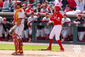 Nebraska Cornhusker Jett Buck (1) claps celebrating scoring a run in the first inning against the Southern California Trojans during a college baseball game on Saturday, April 18, 2026, in Lincoln, Neb. Photo by John S. Peterson.